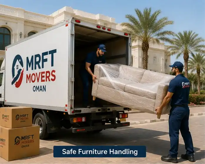 Wrapped furniture secured with straps inside a transport truck