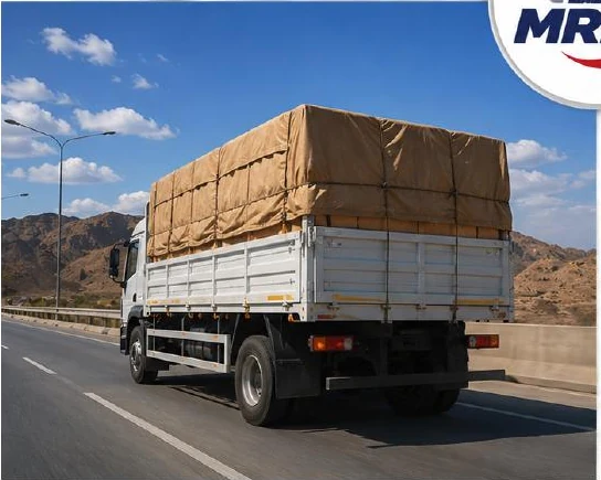 Commercial truck travelling on an Oman route with cargo